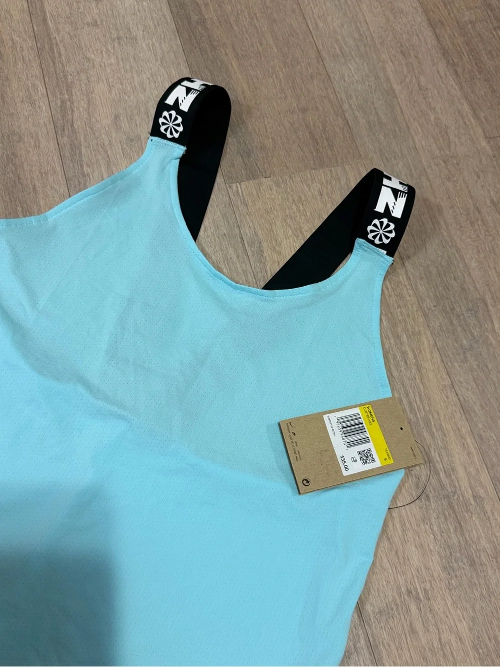 NIKE Women's Light Blue Tank with Black Logo Straps